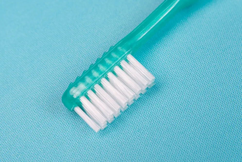 Can a Tufted Toothbrush Damage Your Gums?